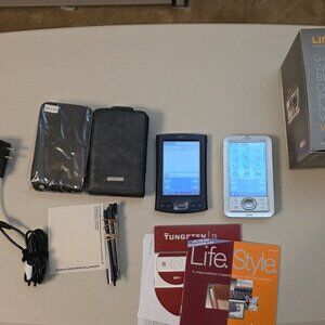 lot of two palm handhelds